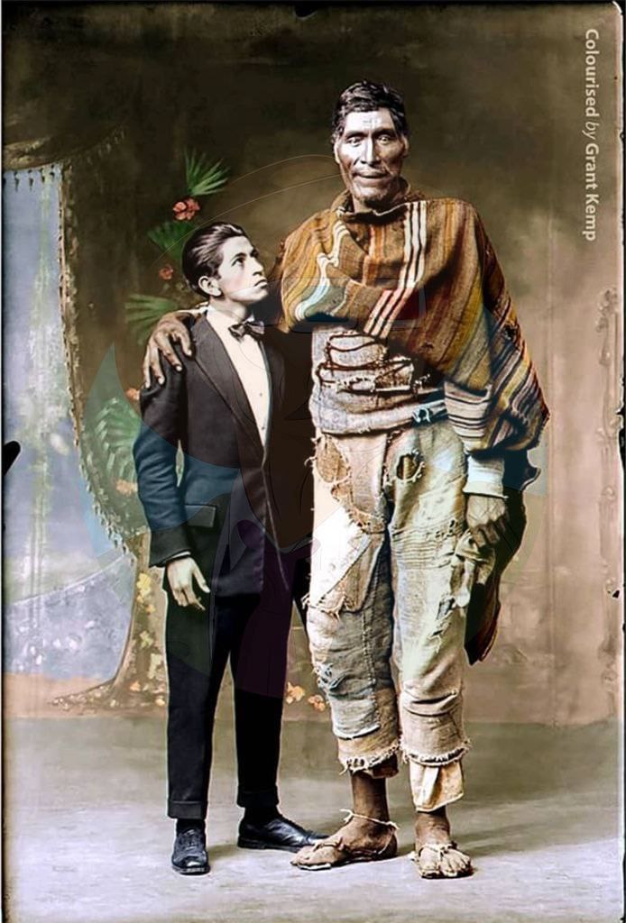 A descendant of the giants, 1925. This photograph was taken by Martin Chambi Jimenez, one of the first known indigenous photographers of Latin America. He was recognized for the profound historical and ethnic documentary value of his photographs. The photo shows a tall man, a native of the southern highlands of the province of Paruro, and the photographer himself. This race of tall people, inhabited parts of the Amazon forests no more than a few centuries ago.